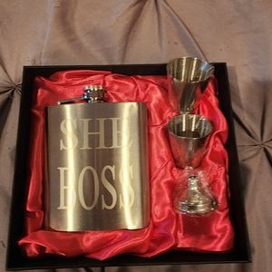 Engraved flask with two shot glasses. Items have never been used.